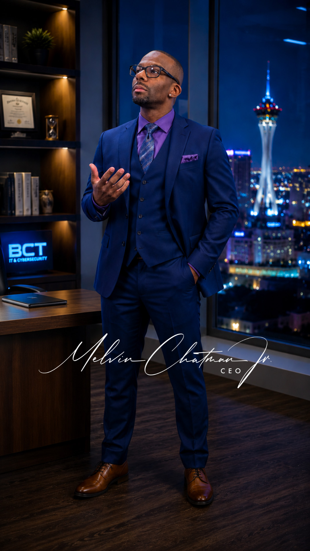 Melvin Chatman Jr., CEO of Business Continuity Technologies, standing in a modern Las Vegas office overlooking the city skyline, representing trusted managed IT services and cybersecurity leadership.
